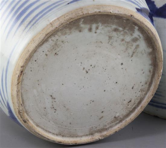 Two Chinese blue and white ovoid jars and covers, 19th century, height 21.5cm and 23.5cm